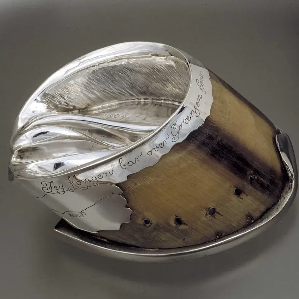 The silver-mounted horse’s hoof  